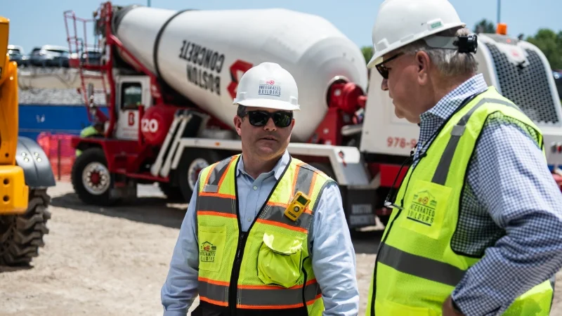 Jay Darcey and John Concannon at a construction site