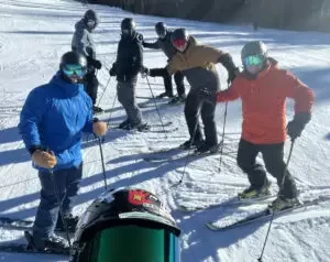 group of skiers in the snow