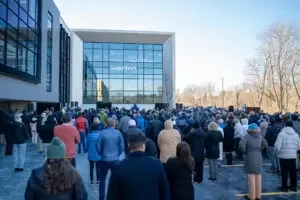 Werfen ribbon cutting crowd
